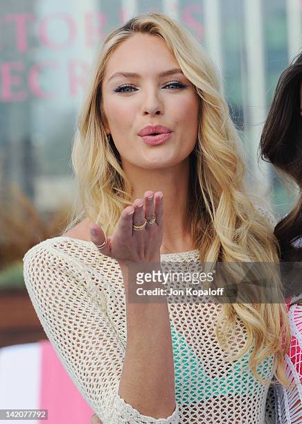 Candice Swanepoel poses at Victoria's Secret Angels Miranda Kerr and Candice Swanepoel Launch The 2012 SWIM Collection at the Thompson Hotel on March...