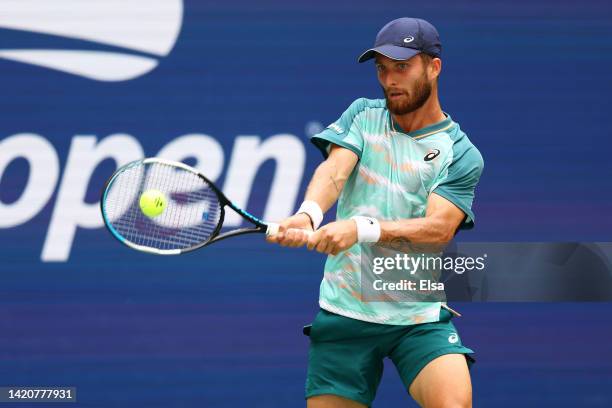 Corentin Moutet of France returns a shot against Casper Ruud of Norway during their Men's Singles Fourth Round match on Day Seven of the 2022 US Open...