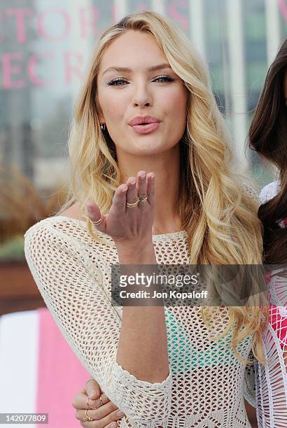 Candice Swanepoel poses at Victoria's Secret Angels Miranda Kerr and Candice Swanepoel Launch The 2012 SWIM Collection at the Thompson Hotel on March...