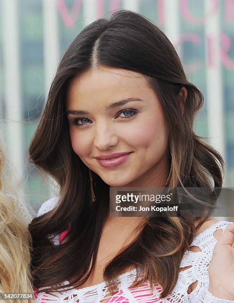 Miranda Kerr poses at Victoria's Secret Angels Miranda Kerr and Candice Swanepoel Launch The 2012 SWIM Collection at the Thompson Hotel on March 29,...