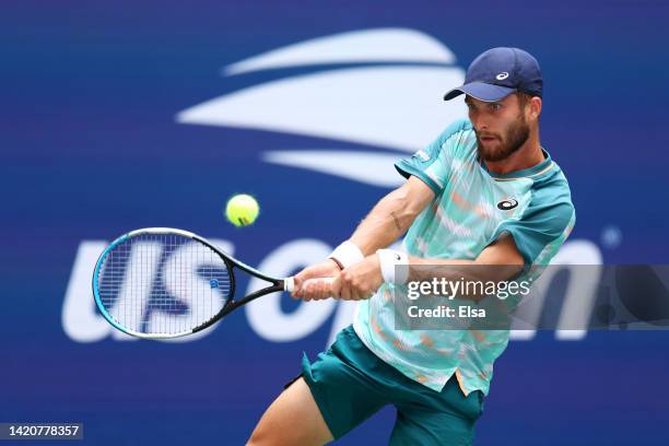 Corentin Moutet of France returns a shot against Casper Ruud of Norway during their Men's Singles Fourth Round match on Day Seven of the 2022 US Open...