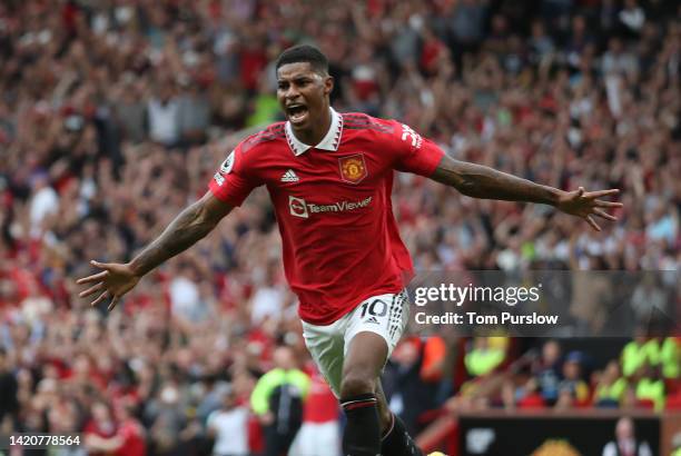 Marcus Rashford of Manchester United celebrates scoring their second goal during the Premier League match between Manchester United and Arsenal FC at...