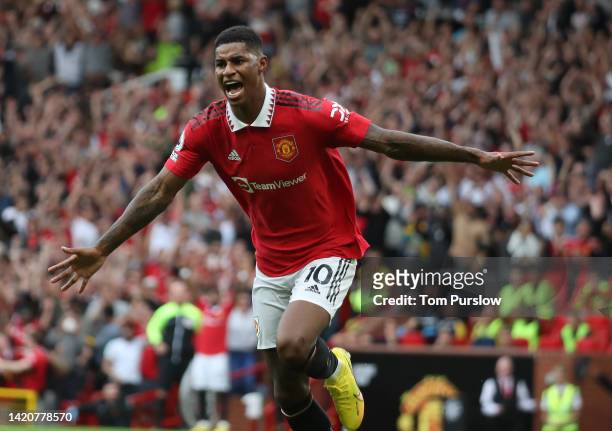 Marcus Rashford of Manchester United celebrates scoring their second goal during the Premier League match between Manchester United and Arsenal FC at...