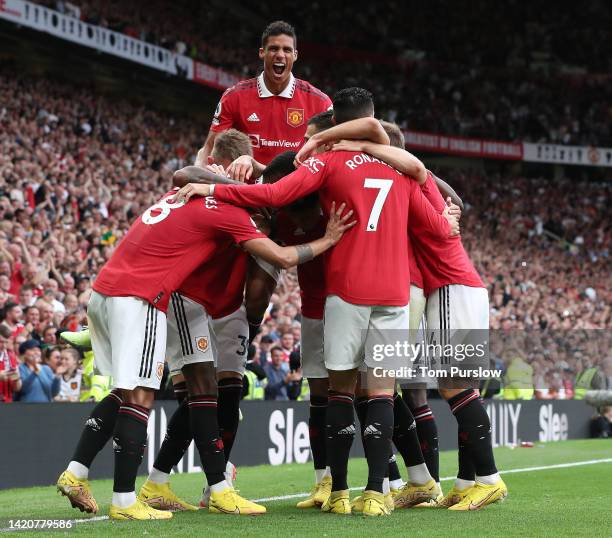 Marcus Rashford of Manchester United celebrates scoring their second goal during the Premier League match between Manchester United and Arsenal FC at...