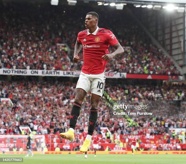 Marcus Rashford of Manchester United celebrates scoring their second goal during the Premier League match between Manchester United and Arsenal FC at...