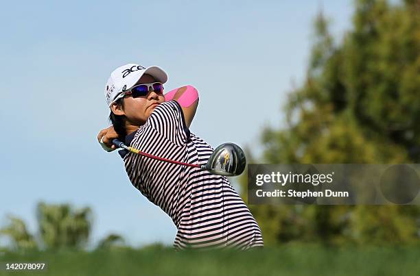 Yani Tseng of Taiwan hits her tee shot on the 11th hole during the first round of the Kraft Nabisco Championship at Mission Hills Country Club on...