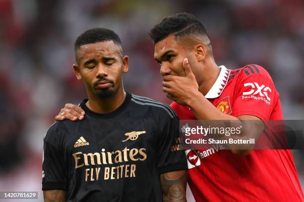 Gabriel Jesus of Arsenal interacts with Casemiro of Manchester United during the Premier League match between Manchester United and Arsenal FC at Old...