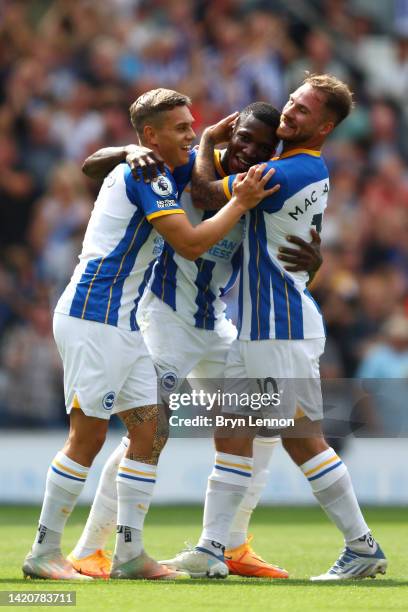 Moises Caicedo of Brighton & Hove Albion celebrates with team mates after scoring their sides second goal during the Premier League match between...