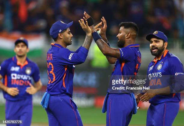 Hardik Pandya of India celebrates with team mates after dismissing Mohammad Rizwan of Pakistan during the DP World Asia Cup match between India and...