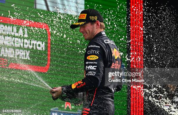 Race winner Max Verstappen of the Netherlands and Oracle Red Bull Racing celebrates on the podium during the F1 Grand Prix of The Netherlands at...