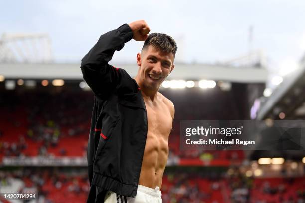 Lisandro Martinez of Manchester United celebrates following their sides victory in the Premier League match between Manchester United and Arsenal FC...