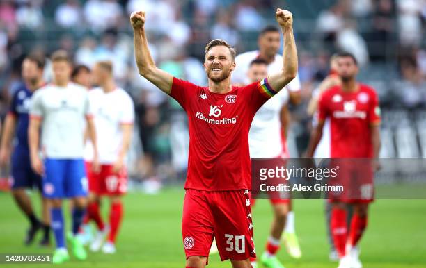Silvan Widmer of FSV Mainz acknowledges the fans following their side's victory in the Bundesliga match between Borussia Moenchengladbach and 1. FSV...
