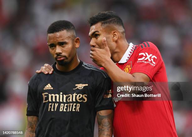 Gabriel Jesus of Arsenal interacts with Casemiro of Manchester United during the Premier League match between Manchester United and Arsenal FC at Old...