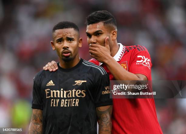 Gabriel Jesus of Arsenal interacts with Casemiro of Manchester United during the Premier League match between Manchester United and Arsenal FC at Old...