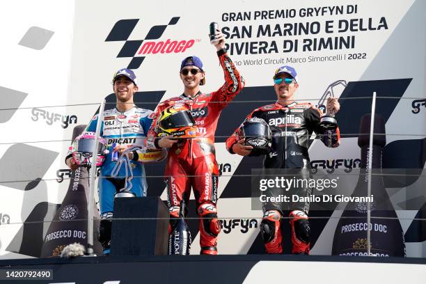 Enea Bastianini of Italy and Gresini Racing MotoGP , Francesco Bagnaia of Italy and Ducati Lenovo Team and Maverick Vinales of Spain and Aprilia...