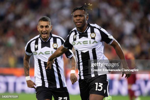 Destiny Udogie of Udinese Calcio celebrates after scoring his team's first goal during the Serie A match between Udinese Calcio and AS Roma at Dacia...