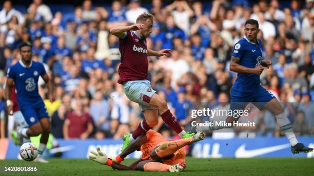 Jarrod Bowen of West Ham United fouls Edouard Mendy of Chelsea leading to a VAR decision to disallow West Ham's 2nd goal during the Premier League...