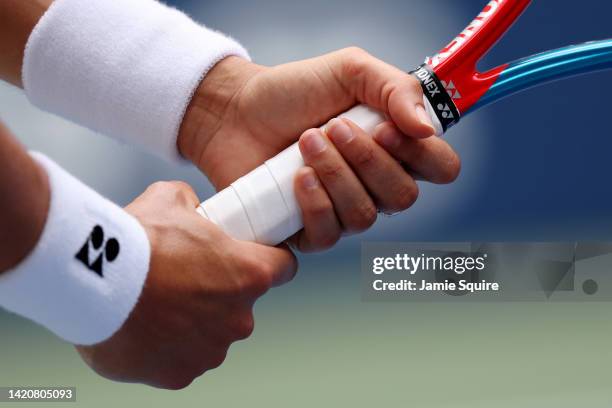 Caroline Garcia of France grips her racket against Alison Riske-Amritraj of the United States during their Women's Singles Fourth Round match on Day...