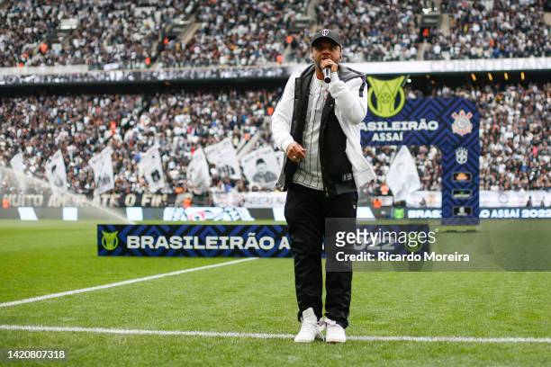 The singer Fernandinho Beat Box sings the anthem of Corinthians before the match between Corinthians and Internacional as part of Brasileirao Series...