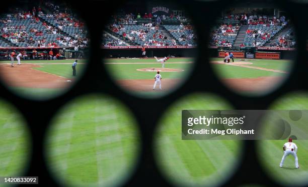 Tucker Davidson of the Los Angeles Angels pitches to Christian Vazquez of the Houston Astros in the second inning at Angel Stadium of Anaheim on...