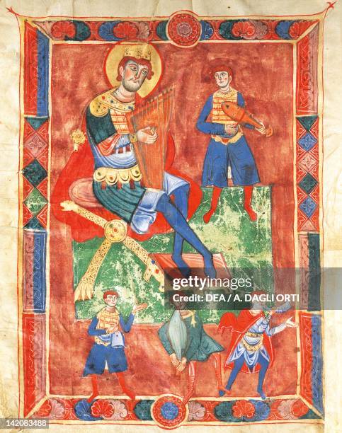 King David performing the lyre surrounded by musicians, miniature from a medieval Psaltery, Italy 12th Century.