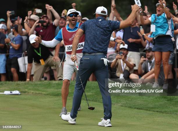 Team Captain Dustin Johnson of 4 Aces GC reacts after winning the LIV Golf Invitational - Boston on the first playoff hole at The Oaks golf course at...