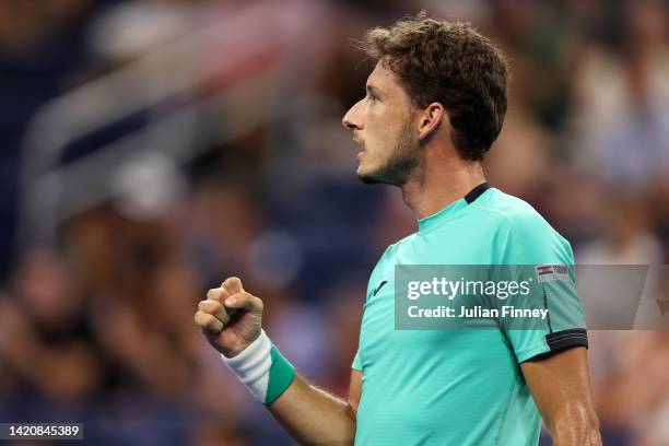 Pablo Carreno Busta of Spain reacts against Karen Khachanov of Russia during their Men's Singles Fourth Round match on Day Seven of the 2022 US Open...