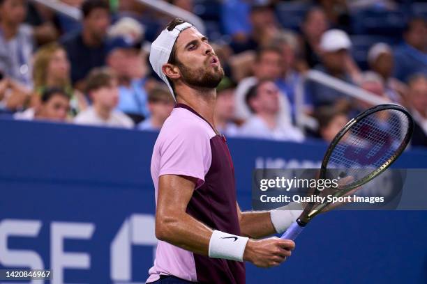 Karen Khachanov of Russia reacts to a lost point against Pablo Carreno of Spain during their Men's Singles Fourth Round match on Day Seven of the...