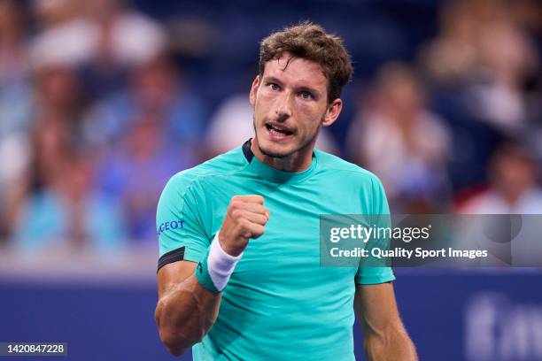 Pablo Carreno of Spain celebrates a point against Karen Khachanov of Russia during their Men's Singles Fourth Round match on Day Seven of the 2022 US...