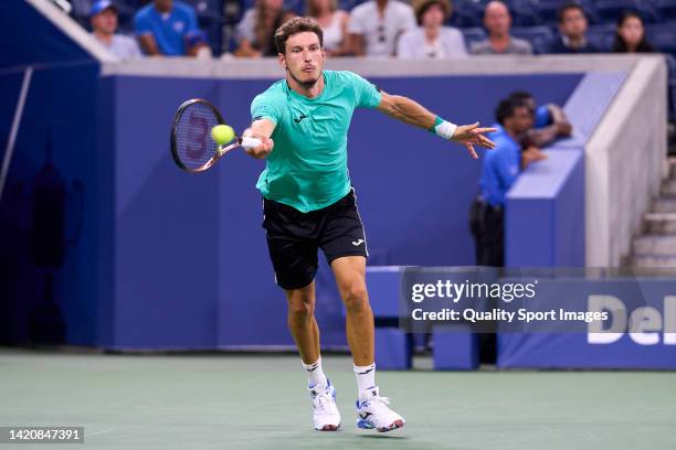 Pablo Carreno of Spain returns a ball to Karen Khachanov of Russia during their Men's Singles Fourth Round match on Day Seven of the 2022 US Open at...