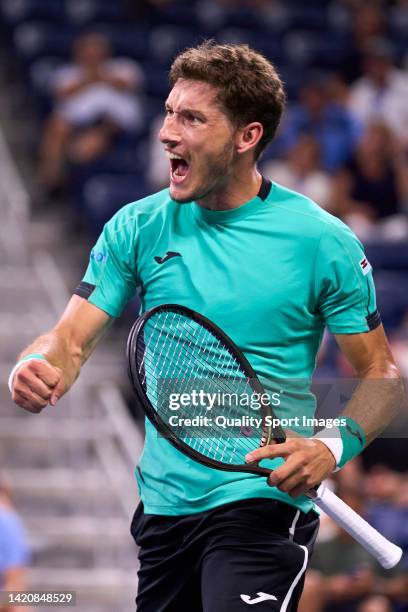 Pablo Carreno of Spain celebrates a point against Karen Khachanov of Russia during their Men's Singles Fourth Round match on Day Seven of the 2022 US...