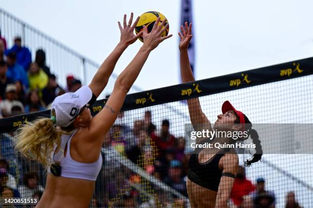 Melissa Humana-Paredes spikes the volleyball agains Taryn Kloth during the AVP Gold Series Chicago Open at Pomellato’s Oak Street Boutique on...