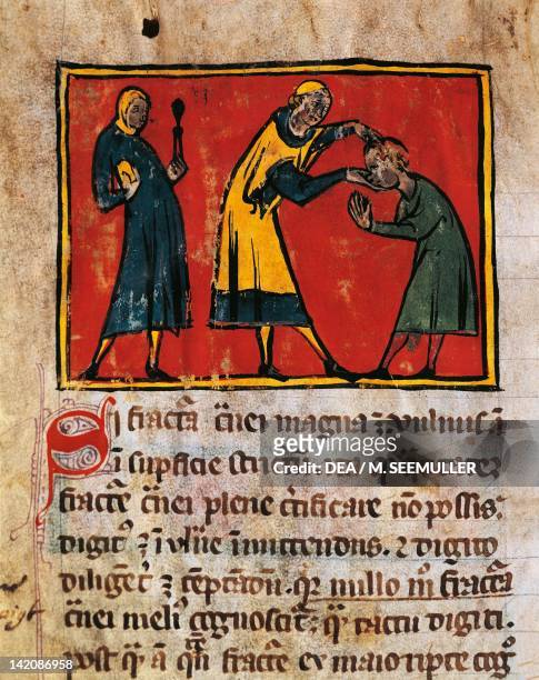 Doctor curing a patient, miniature from The Surgery of Master Rogerius by Roggerio dei Frugardi or Rogerius Salernitanus, Latin manuscript, France...