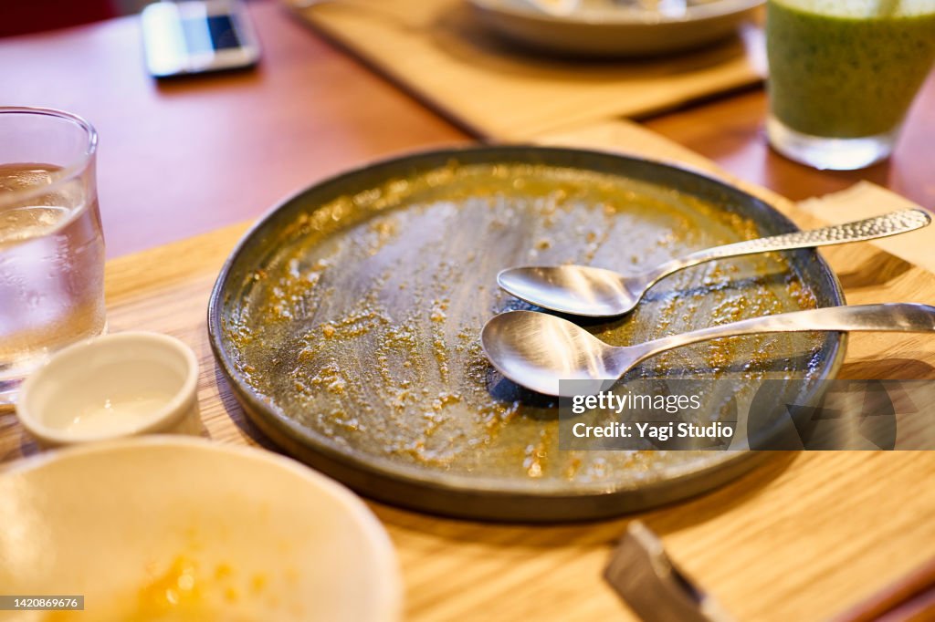 Plates after eating curry at the Vegan Cafe.