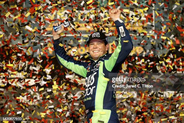 Erik Jones, driver of the FOCUSfactor Chevrolet, celebrates in victory lane after winning the NASCAR Cup Series Cook Out Southern 500 at Darlington...