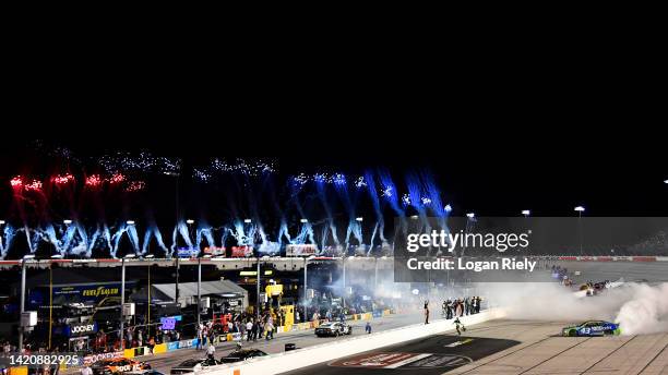 Erik Jones, driver of the FOCUSfactor Chevrolet, celebrates with a burnout after winning the NASCAR Cup Series Cook Out Southern 500 at Darlington...