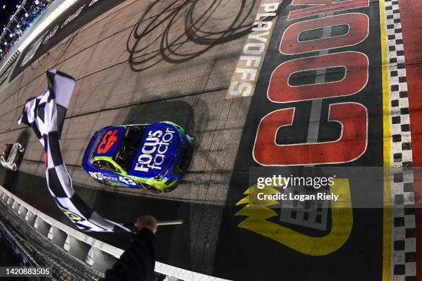 Erik Jones, driver of the FOCUSfactor Chevrolet, takes the checkered flag to win the NASCAR Cup Series Cook Out Southern 500 at Darlington Raceway on...