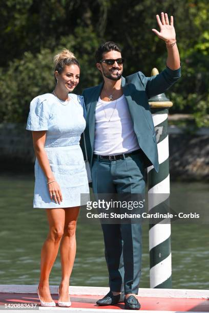 Eleonora Brunacci and Mariano Di Vaio a seen arriving at the Excelsior pier during the 79th Venice International Film Festival on September 04, 2022...