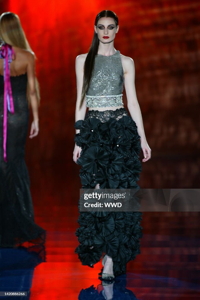 Models 2003 A model walks down the runway at the Spring 2003 Valentino show in ...