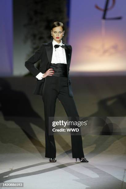 Model Natalia Seminova in YSL's 1966 tuxedo during the Saint Laurent's Spring 2002 Couture collection and 40th anniversary retrospective runway show...