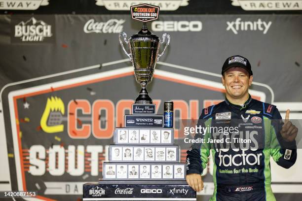 Erik Jones, driver of the FOCUSfactor Chevrolet celebrates in victory lane after winning the NASCAR Cup Series Cook Out Southern 500 at Darlington...