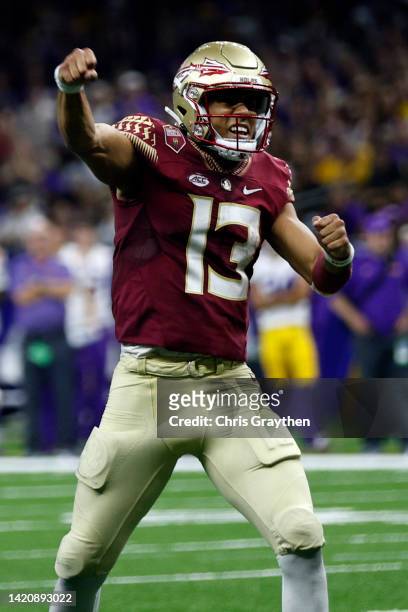 Quarterback Jordan Travis of the Florida State Seminoles reacts after a touchdown against the LSU Tigers at Caesars Superdome on September 04, 2022...