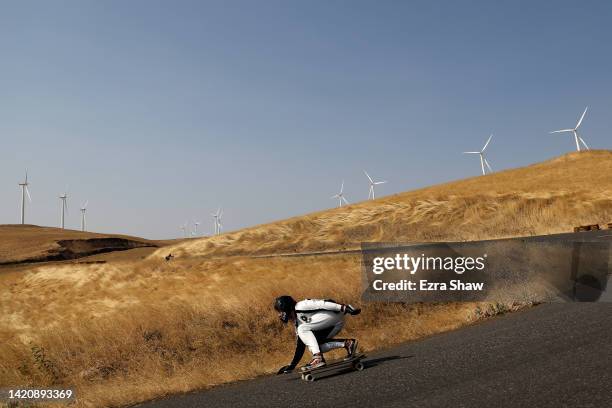 Skateboarder rides down the Maryhill Loops Road during the Maryhill Ratz Freeride on September 03, 2022 in Maryhill, Washington. The Maryhill Ratz...