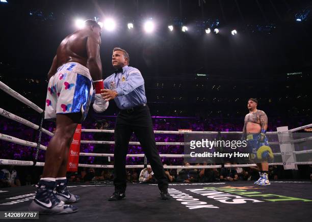 Luis Ortiz receives a count from referee Thomas Taylor in his unanimous decision loss to Andy Ruiz Jr. During a WBC world heavyweight title...