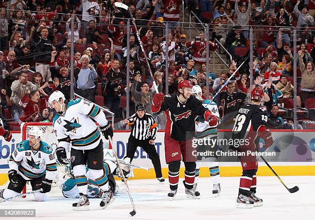 Martin Hanzal and Ray Whitney of the Phoenix Coyotes celebrate after Radim Vrbata scored a second-period power-play goal against the San Jose Sharks...