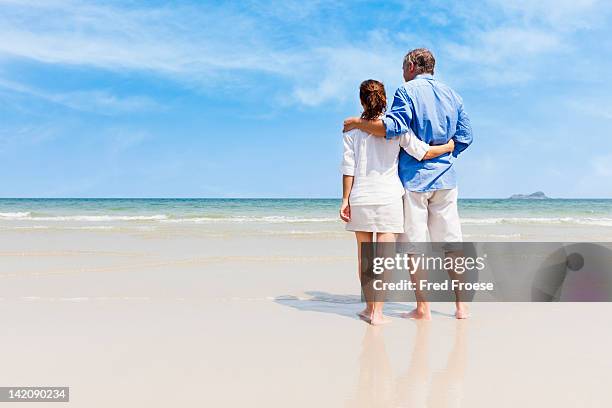 mature couple on beach - hua hin thailand stockfoto's en -beelden