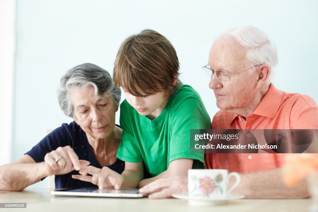 Seniors using digital device