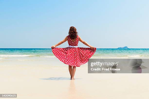 woman on beach - sundress stock pictures, royalty-free photos & images