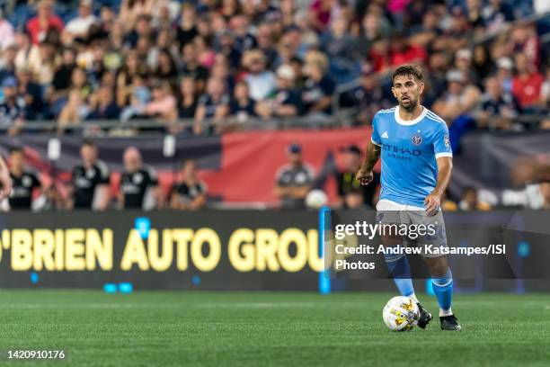 Nicolas Acevedo of New York City FC brings the ball forward during a game between New York City FC and New England Revolution at Gillette Stadium on...