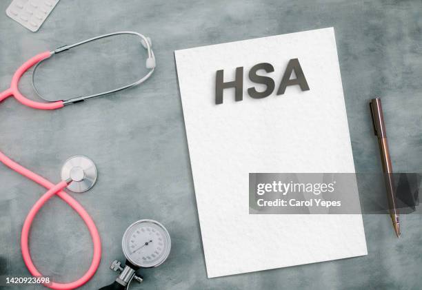 hsa written in  medical desktop - health savings account stockfoto's en -beelden